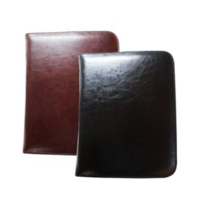 PORTA CUADERNO KOURUS CUERO CIERRE NEGRO Y CAFÉ